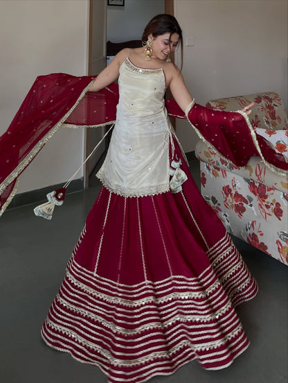 Ivory Peplum Choli with Wine Flared Lehenga- Festive & Wedding  Wear