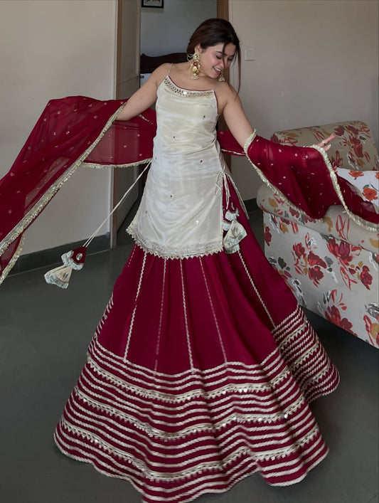 Ivory Peplum Choli with Wine Flared Lehenga- Festive & Wedding  Wear