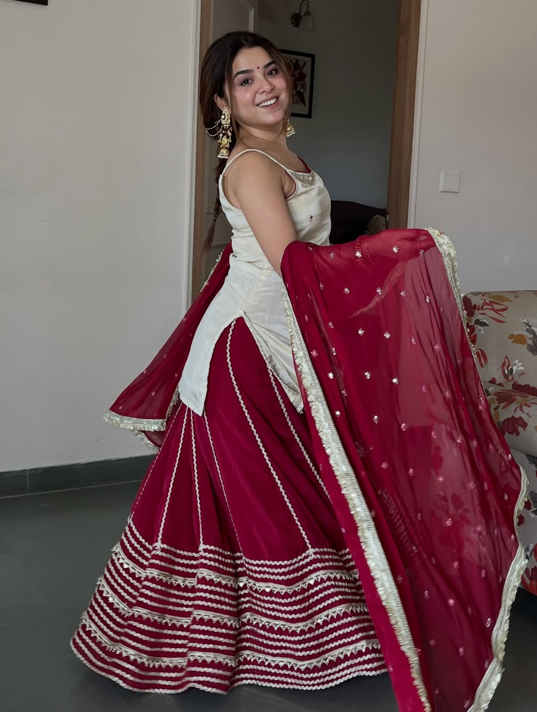 Ivory Peplum Choli with Wine Flared Lehenga- Festive & Wedding  Wear