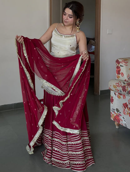 Ivory Peplum Choli with Wine Flared Lehenga- Festive & Wedding  Wear