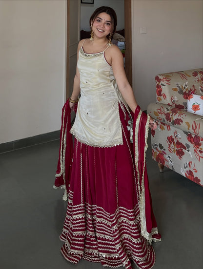 Ivory Peplum Choli with Wine Flared Lehenga- Festive & Wedding  Wear