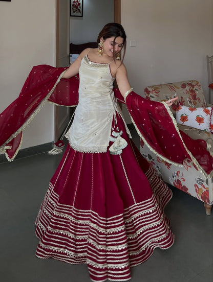 Ivory Peplum Choli with Wine Flared Lehenga- Festive & Wedding  Wear