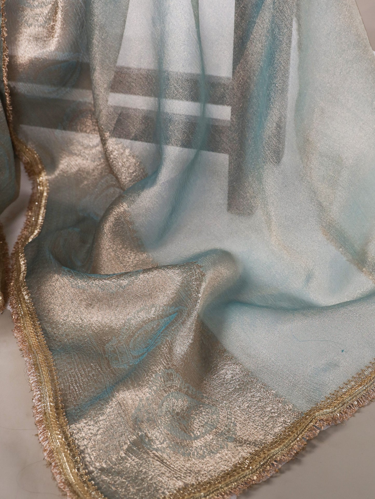 Graceful Tissue Shimmer Saree With Zari Weaving Work-Royalty Look