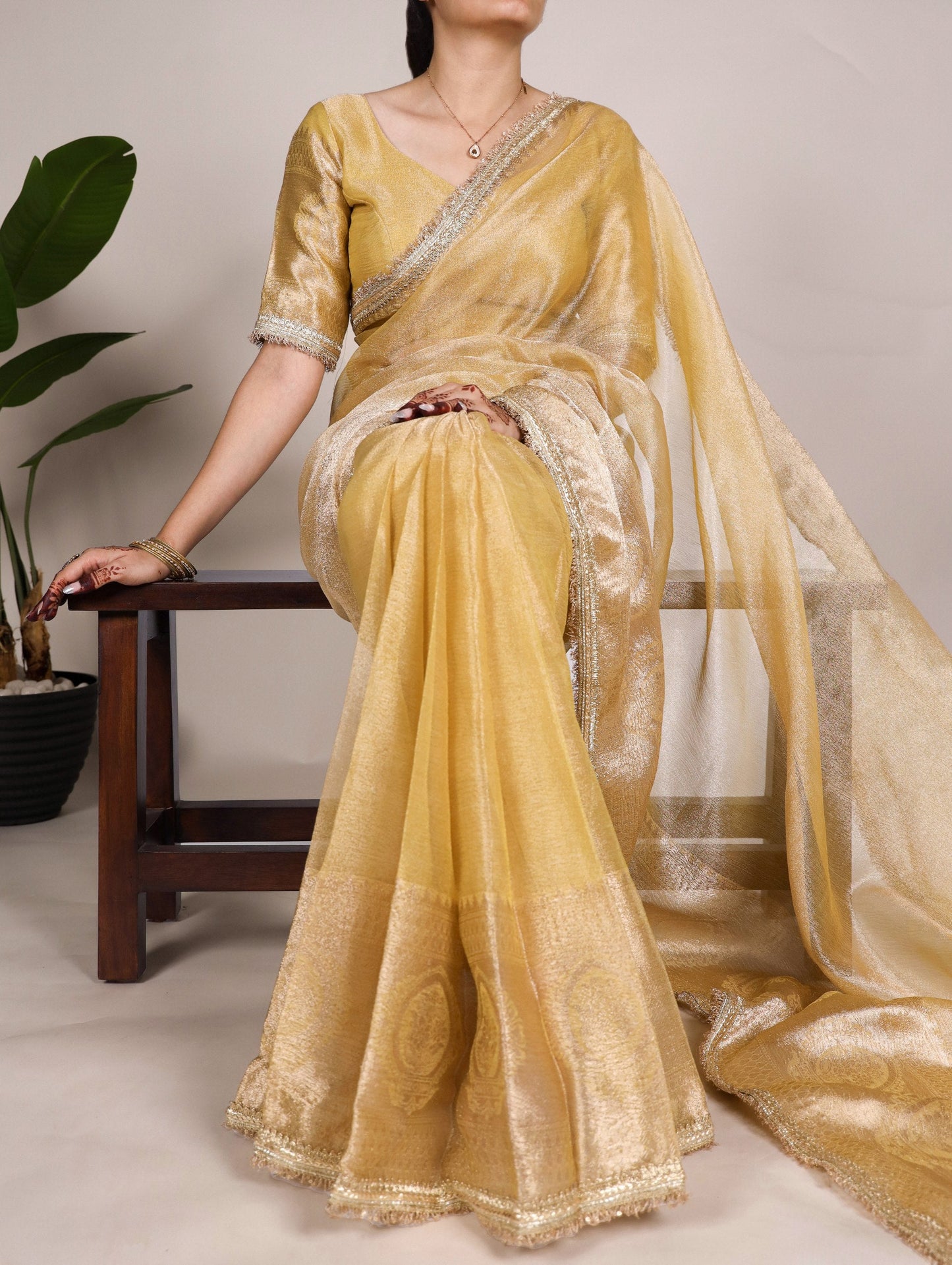 Graceful Tissue Shimmer Saree With Zari Weaving Work-Royalty Look