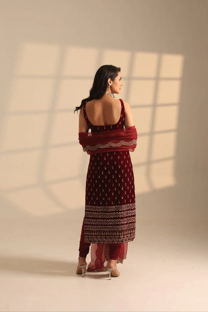 Maroon embroidered Anarkali suit with backless design, perfect for weddings and festivals