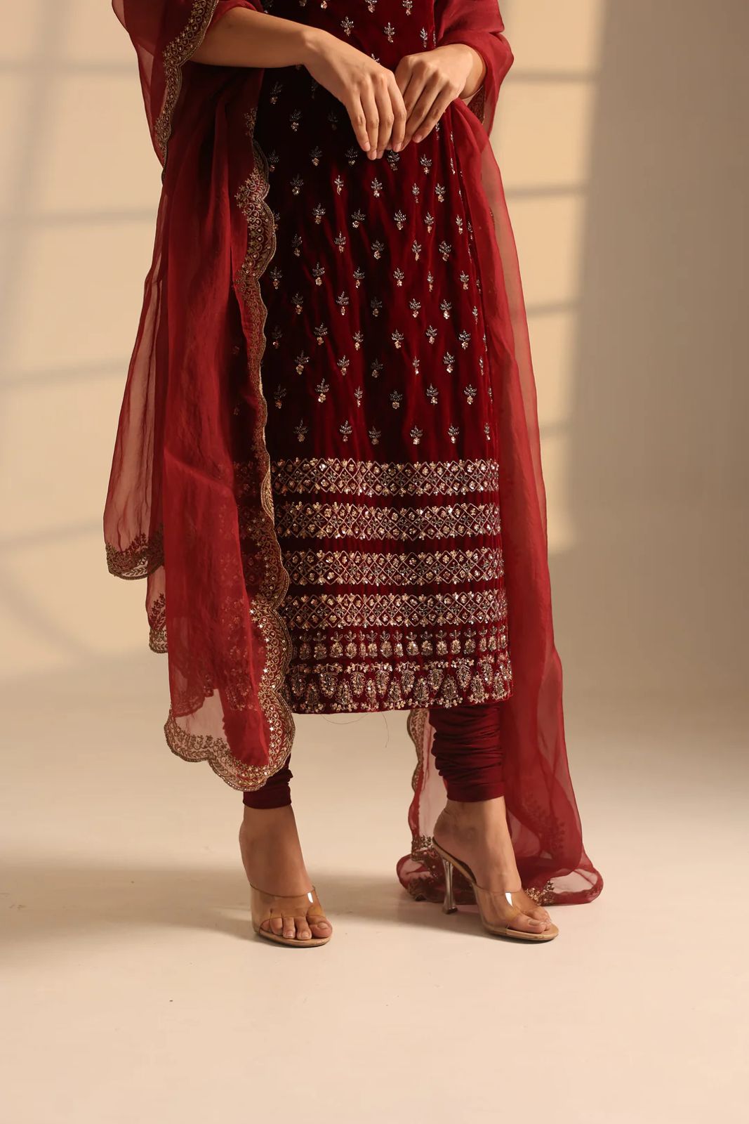 Maroon embroidered Anarkali suit with sheer dupatta, perfect for weddings and festivals