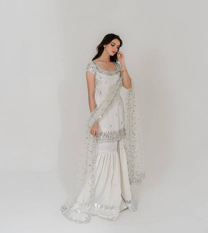 Elegant White Faux Georgette Sharara Suit with Mirror & Sequins Work